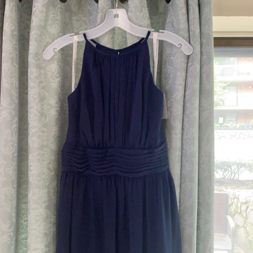 Navy blue bridesmaid dress from David’s Bridal.